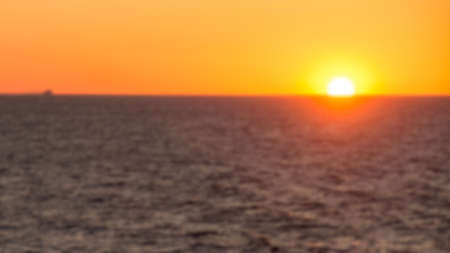 out of focus sun and seaの写真素材