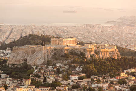 Acropolis dominates the city skyline of Athens , Greeceの写真素材