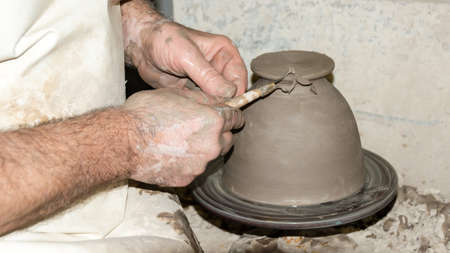 photograph of making ceramic vases with ribbon tools in 16: 9 photo formatの写真素材