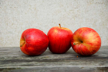 three red applesの写真素材