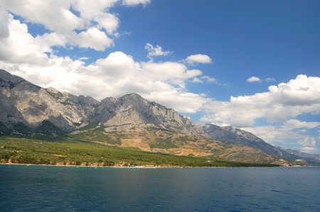Spectacular clouds over Baska Voda on Adriatic coast in Croatiaの写真素材