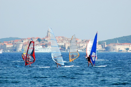Korcula, Croatia  July 23, 2007 : Plenty of surfers surfing nearby Korcula.のeditorial素材