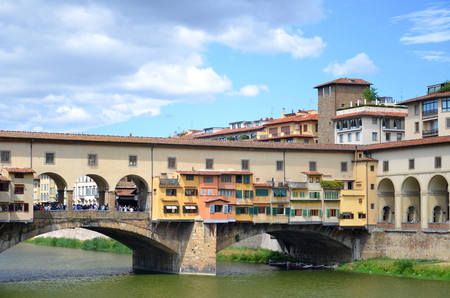 Ponte Vecchio over Arno River in Florence, Italyの写真素材