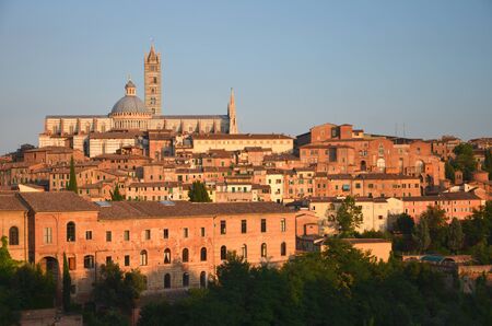 Gorgeous panorama of Siena at sunset, Tuscany, Italyの写真素材