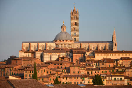 Gorgeous panorama of Siena at sunset, Tuscany, Italyの写真素材