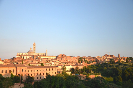 Gorgeous panorama of Siena at sunset, Tuscany, Italyの写真素材