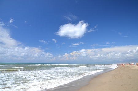 Restless sea on sandy beach Marina di Vecchiano nearby Pisa, Tuscany in Italy の写真素材