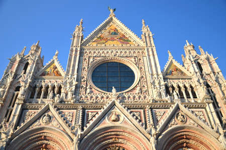 FaÃ§ade of magnificent marble cathedral in Siena, Italyの写真素材