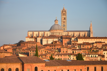 Gorgeous panorama of Siena at sunset, Tuscany, Italyの写真素材