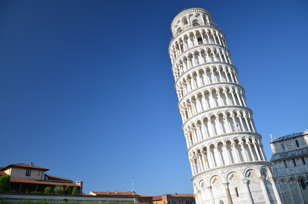 The famous Leaning Tower on Square of Miracles in Pisa, Tuscany in Italyの写真素材
