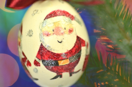 Christmas bauble  made by decoupage technique on bokeh backgroundの写真素材