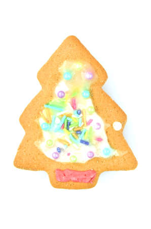 Delicious decorated Christmas cookie isolated on white backgroundの写真素材