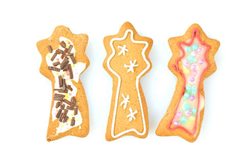 Delicious decorated Christmas cookies isolated on white backgroundの写真素材