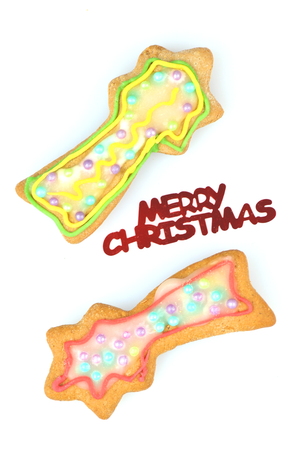 Delicious decorated Christmas cookies isolated on white backgroundの写真素材