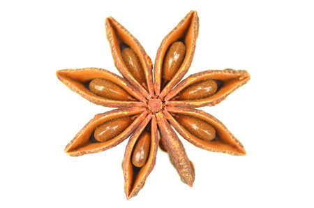 christmas spices, anise star isolated on white background の写真素材