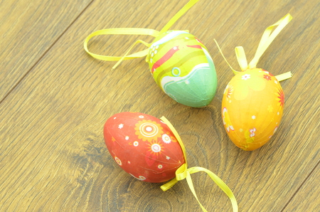 colorful Easter eggs lying on a tableの写真素材