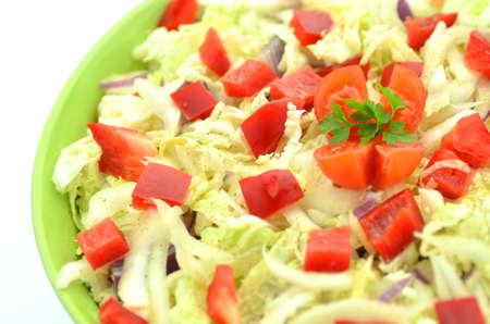 vegetable salad with feta cheese in a bowlの写真素材