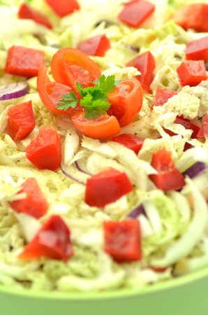 vegetable salad with feta cheese in a bowlの写真素材