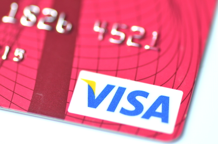 Closeup of VISA credit card isolated on white backgroundのeditorial素材