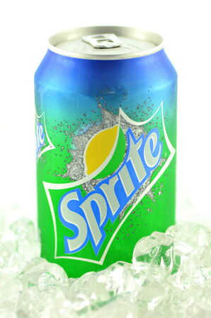 Sprite drink in a can on ice isolated on white backgroundのeditorial素材
