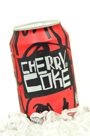 Can of Cherry Coke drink isolated on iceのeditorial素材