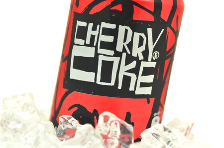 Can of Cherry Coke drink isolated on iceのeditorial素材