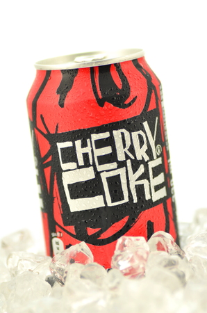 Can of Cherry Coke drink isolated on iceのeditorial素材