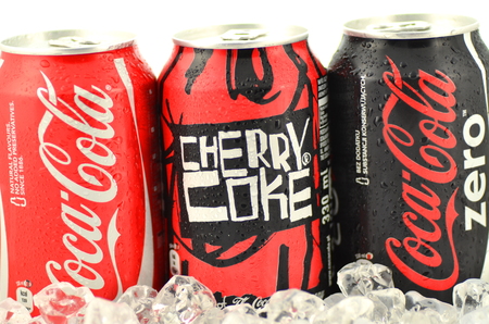 Can of Coca-Cola, Cherry Coke and Coca-Cola Zero drinks on iceのeditorial素材