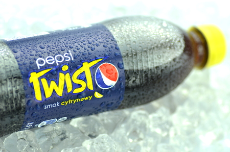 Bottle of Pepsi Twist drink on ice cubesのeditorial素材