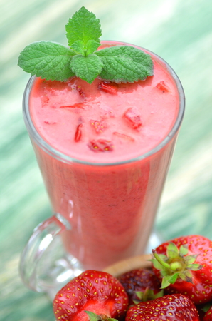 delicious cocktail made of fresh strawberries in a glassの写真素材