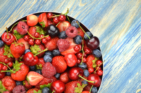variety of soft fruits, strawberries, raspberries, cherries, blueberries, currantsの写真素材