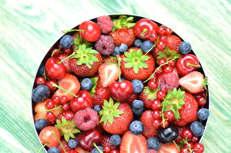 variety of soft fruits, strawberries, raspberries, cherries, blueberries, currantsの写真素材