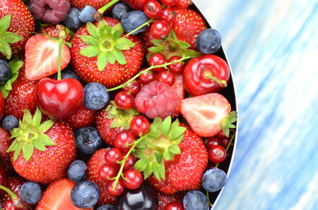 variety of soft fruits, strawberries, raspberries, cherries, blueberries, currantsの写真素材
