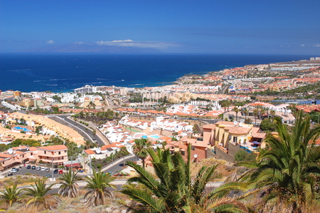 picturesque outstanding landscape of beautiful resort playa de las americas on tenerife, canary islands, spainの写真素材