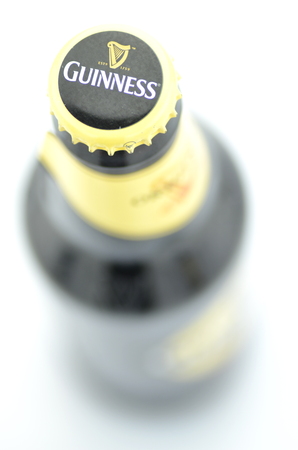 Guinness dry stout beer isolated on white backgroundのeditorial素材