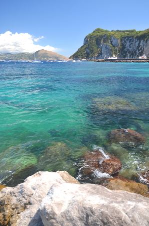 Picturesque summer landscape of beautiful beach in marina grande on capri island, Italyの写真素材