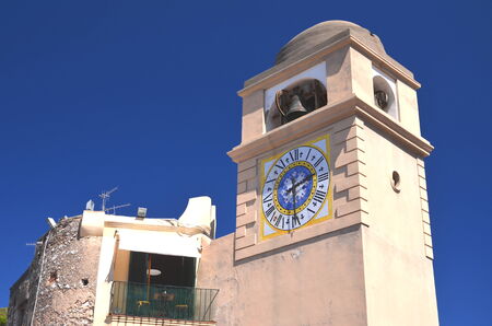 Beautiful historical tower clock on Capri island, Italy