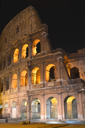Majestic ancient Colosseum by night in Rome, Italyのeditorial素材