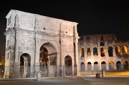 Triumphal Arch of Constantine nearby Colosseum in Rome by night, Italyのeditorial素材