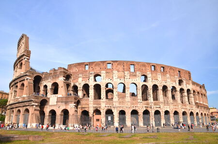 Monumental ancient Colosseum in Rome against blue sky, Italyのeditorial素材