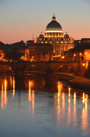 Monumental St. Peters Basilica over Tiber at night in Rome, Italyのeditorial素材