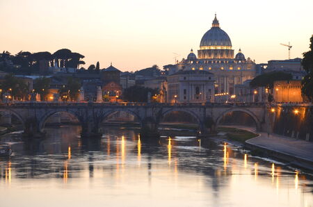 Monumental St. Peters Basilica over Tiber at night in Rome, Italyのeditorial素材