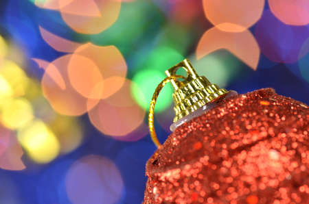 christmas decoration, red Christmas ball on bokeh backgroundの写真素材