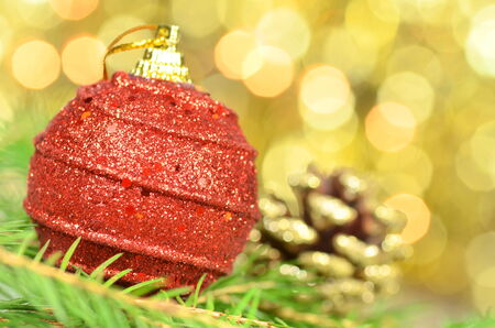 christmas decoration, Christmas ball and cone against bokeh backgroundの写真素材