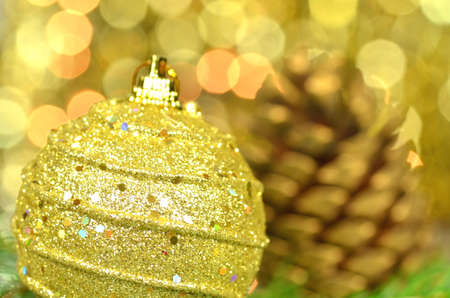 christmas decoration, Christmas ball and cone against bokeh backgroundの写真素材
