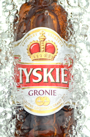 Tyskie pale lager beer in splashed waterのeditorial素材