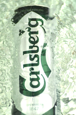 Carlsberg beer in splashed waterのeditorial素材