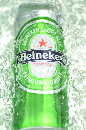 Heineken lager beer in splashed water.のeditorial素材