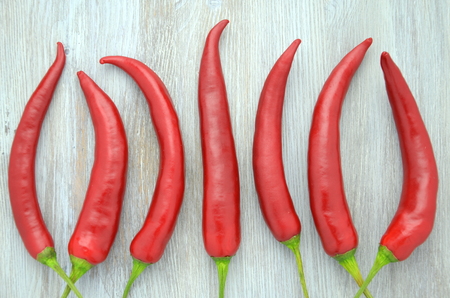 red hot chilli peppers on tableの写真素材