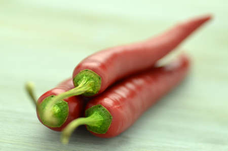 red hot chilli peppers on tableの写真素材